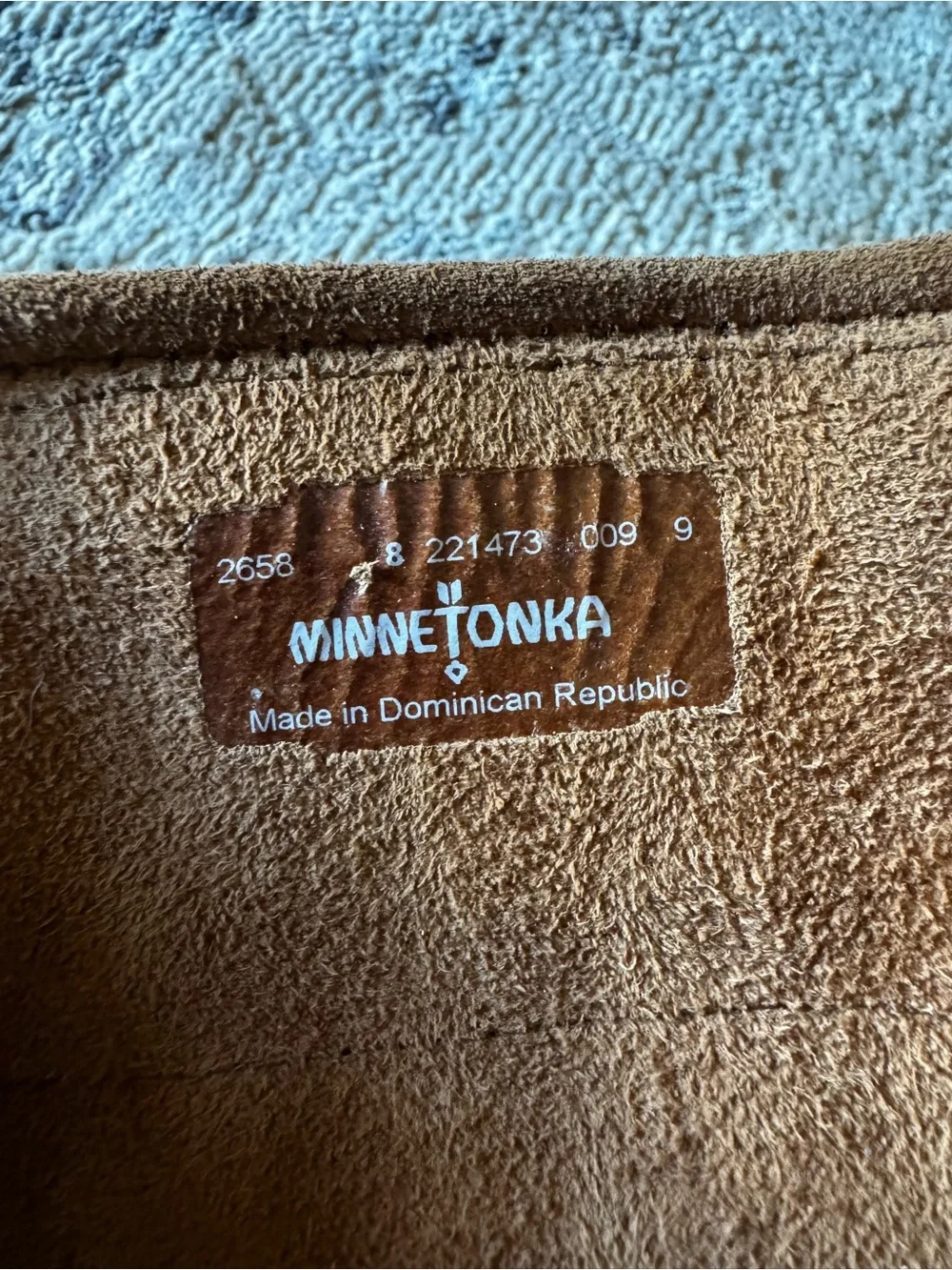 Minnetonka Tan Suede Moccasin Label Close-Up